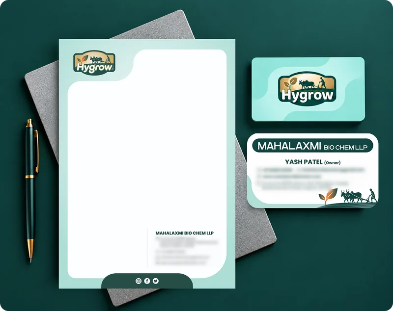 Hygrow letterhead and business cards in mint and deep green, with a notebook and pen
