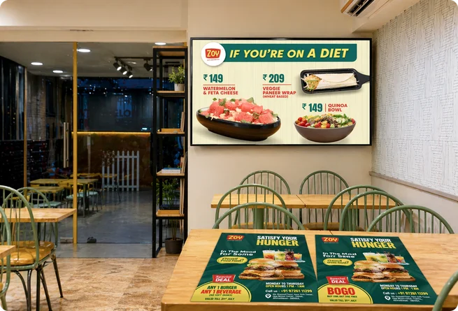 Zoy restaurant interior with digital menu screens and table placemats