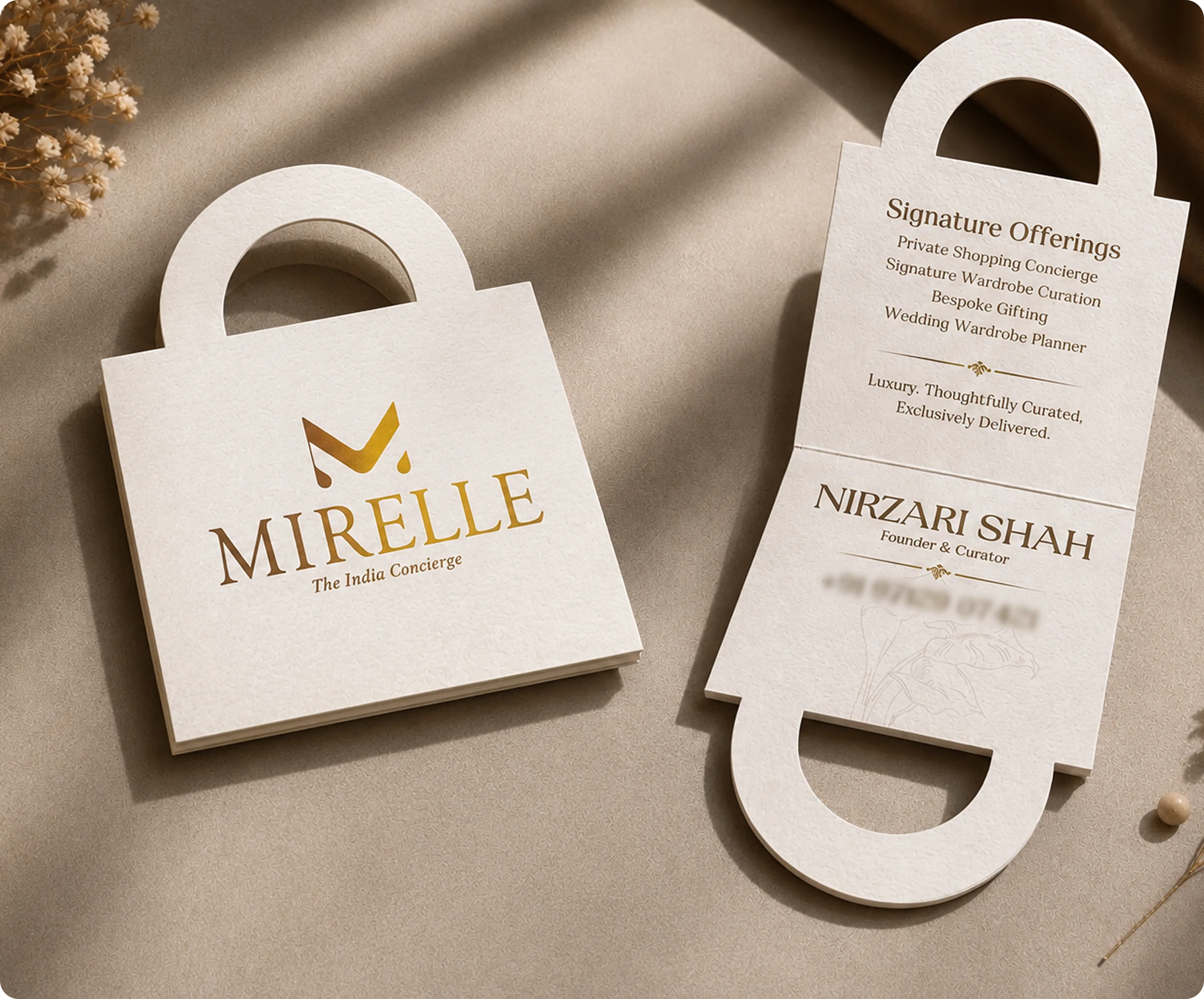 Mirelle branded shopping bag mockup and Nirzari Shah business card
